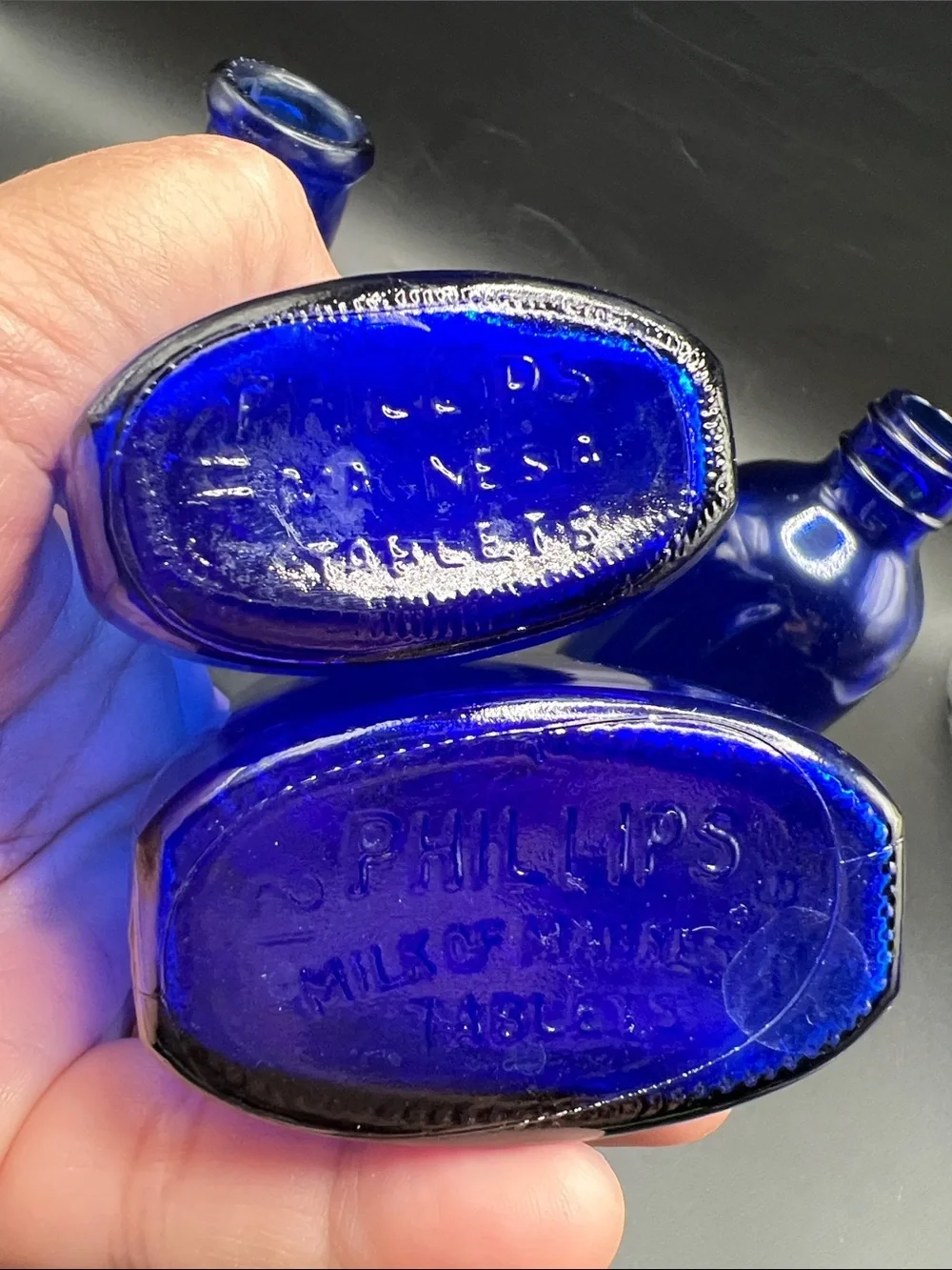 Lot of 4 vintage Colbalt Blue Glass Bottles